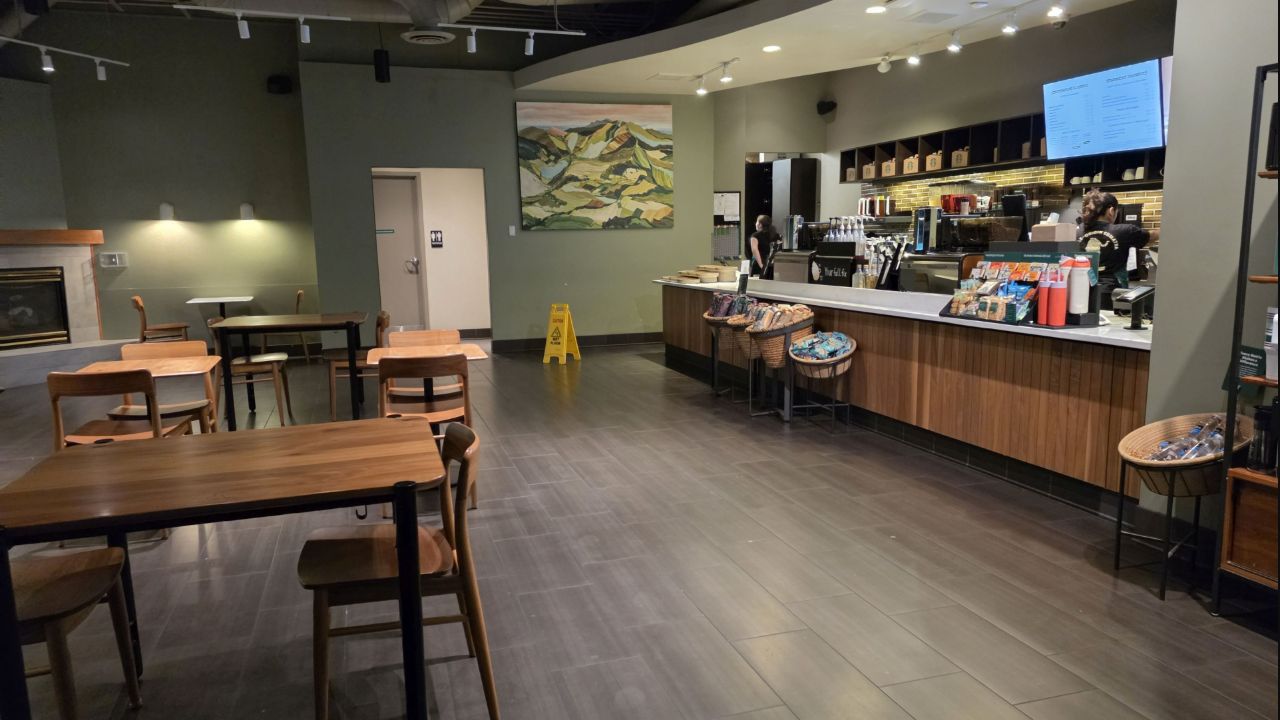 Wooden tables and the coffee-shop counter